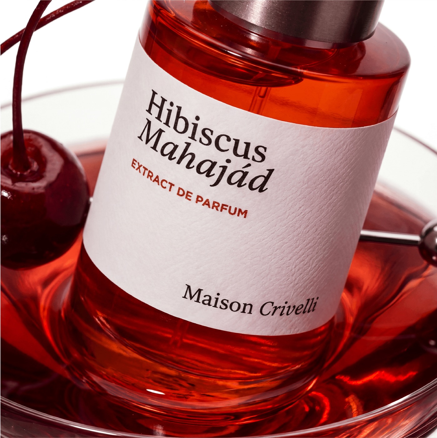 Maison Orsola — flacon Hibiscus Mahajád sur fond rouge